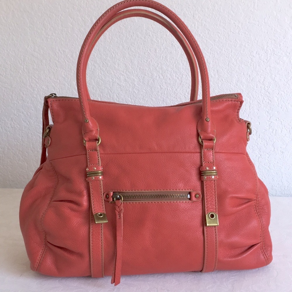 The Saks coral red zip pocket leather bag